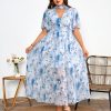 81cdUmTjXjL.jpg Women's 2025 Floral Summer Dress Smocked V Neck Boho Plus Size Beach Party Wedding Guest Ruffle Long Dresses